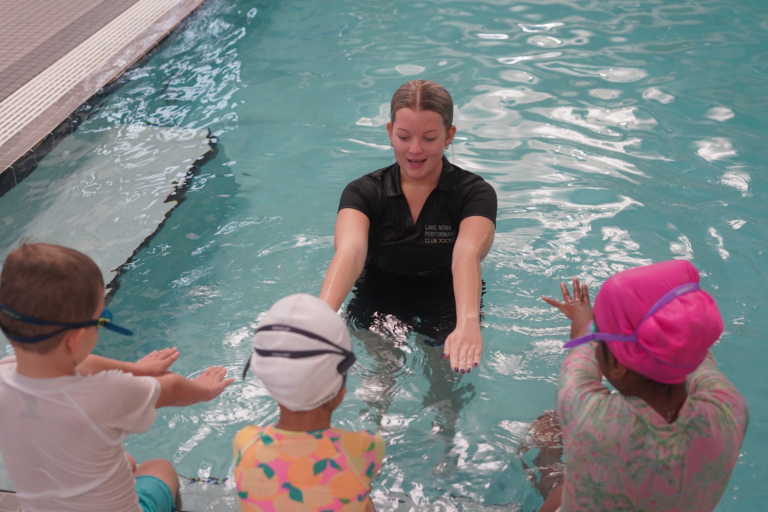 LNPC Learn to Swim instructor teaching children water safety skills