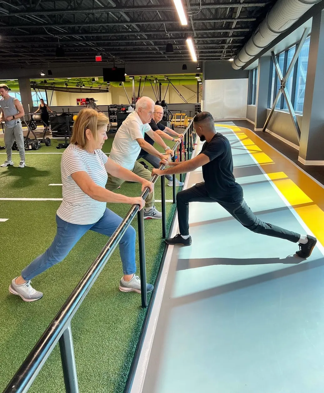 Full performance environment at Lake Nona Performance Club including track, turf, TechnoGym equipment, and recovery amenities