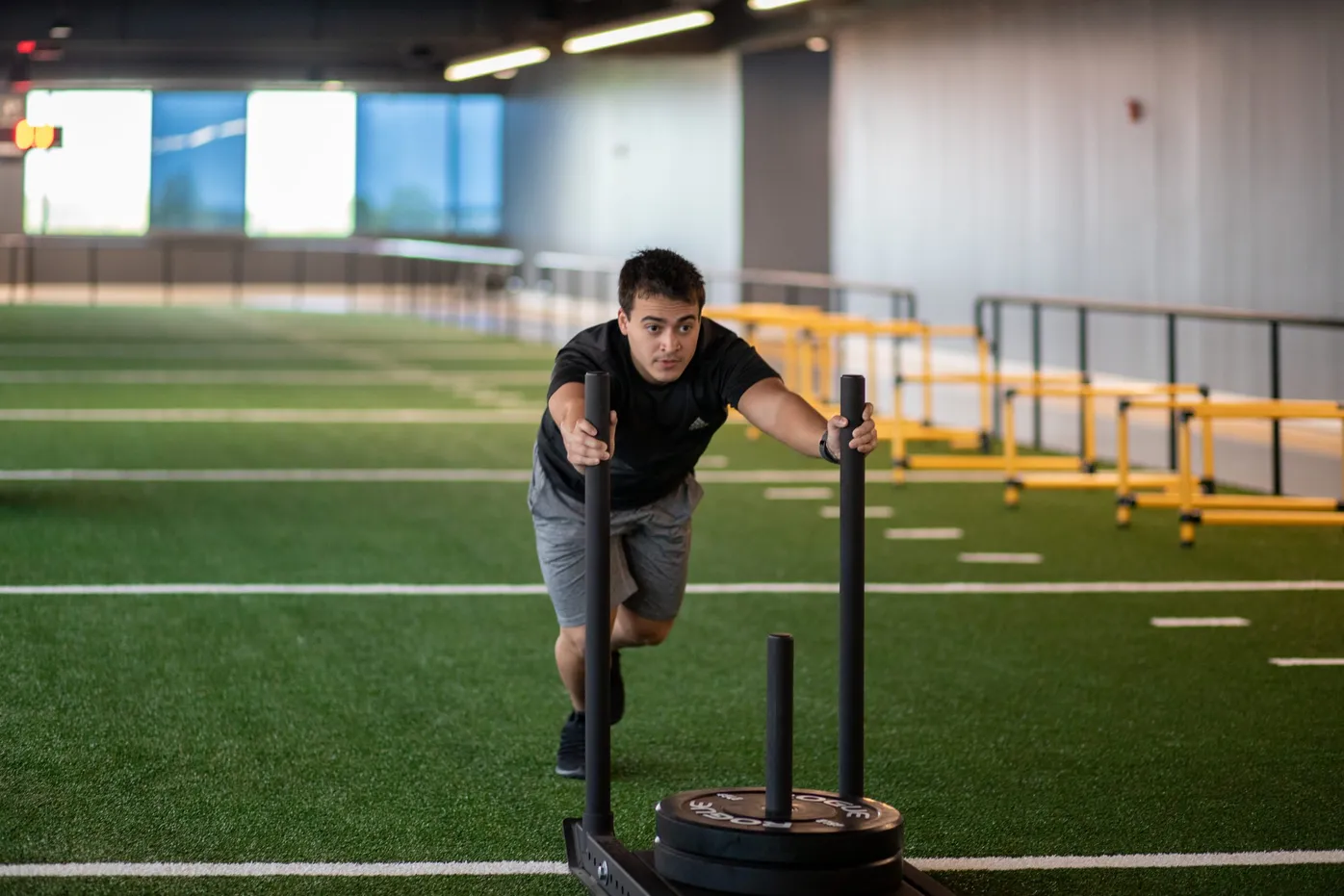 Indoor track and performance turf training area at Lake Nona Performance Club in Orlando, FL
